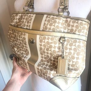 Gold and purple coach purse